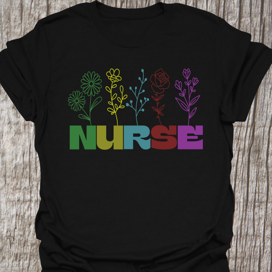Beautiful Nurse t-shirt with the word NURSE each letter being a different color, with a flower attached to the letter in same color, on a black t-shirt