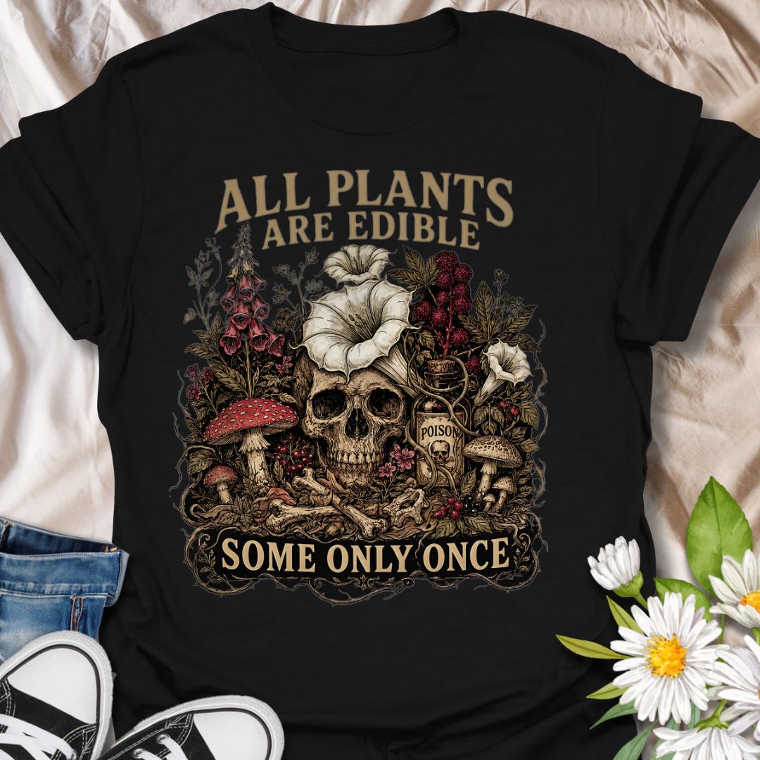 This All Plants Are Edible Some Only Once t-shirt is made for plant lovers with a dark sense of humor and a soft spot for spooky botanical artwork. Featuring a skeleton surrounded by mushrooms, plants, flowers, and vintage-style nature details, this design has a gothic garden feel with a funny cautionary plant message. Perfect for plant lovers, gardeners, mushroom fans, dark cottagecore style lovers, spooky season fans, and anyone who enjoys botanical humor with a slightly morbid twist.