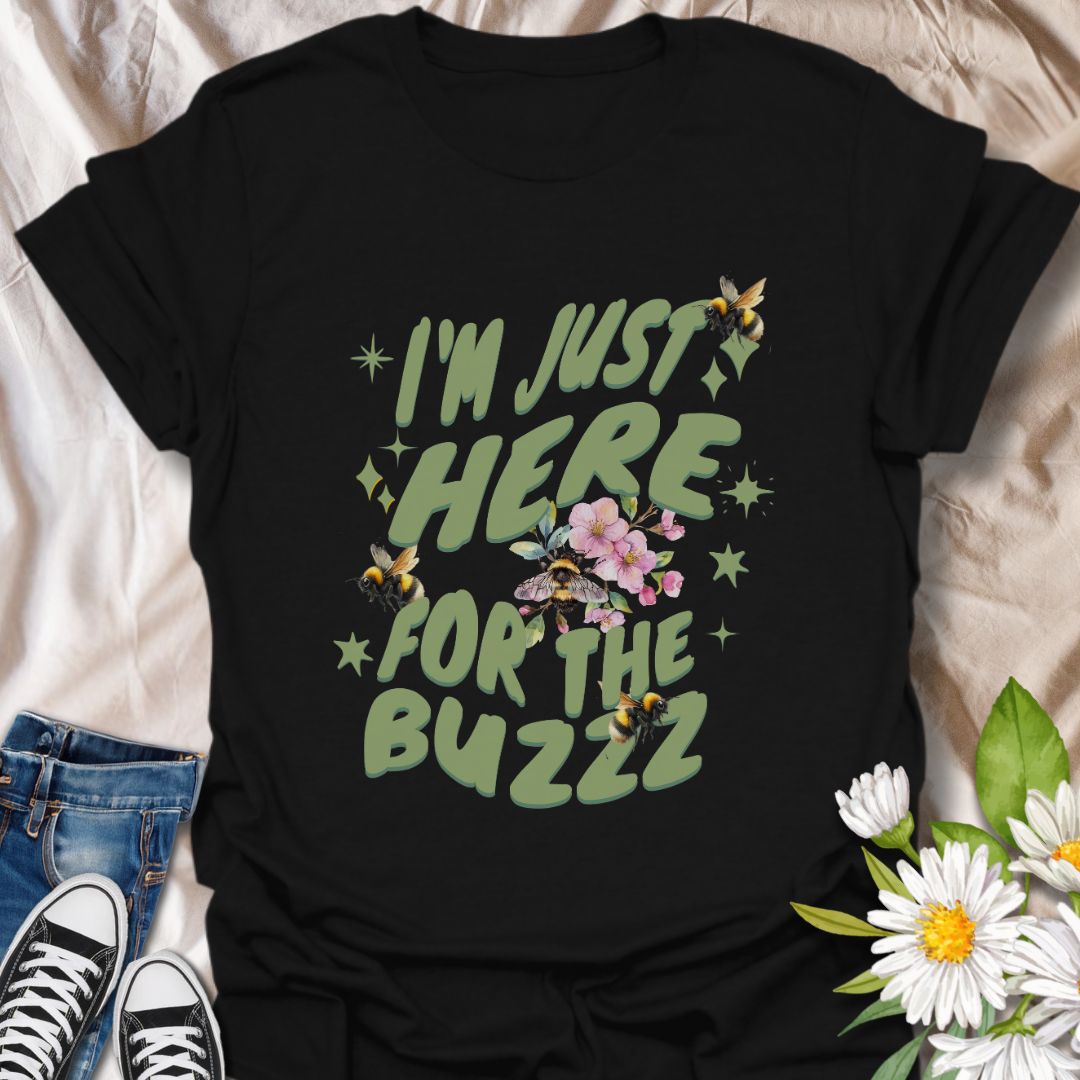 Celebrate your love for bees and humor with this fun "I'm Just Here for the Buzz" design. Adorned with buzzing bees, flowers, and playful lettering, it's perfect for bee enthusiasts, gardeners, or anyone who loves a good pun.
