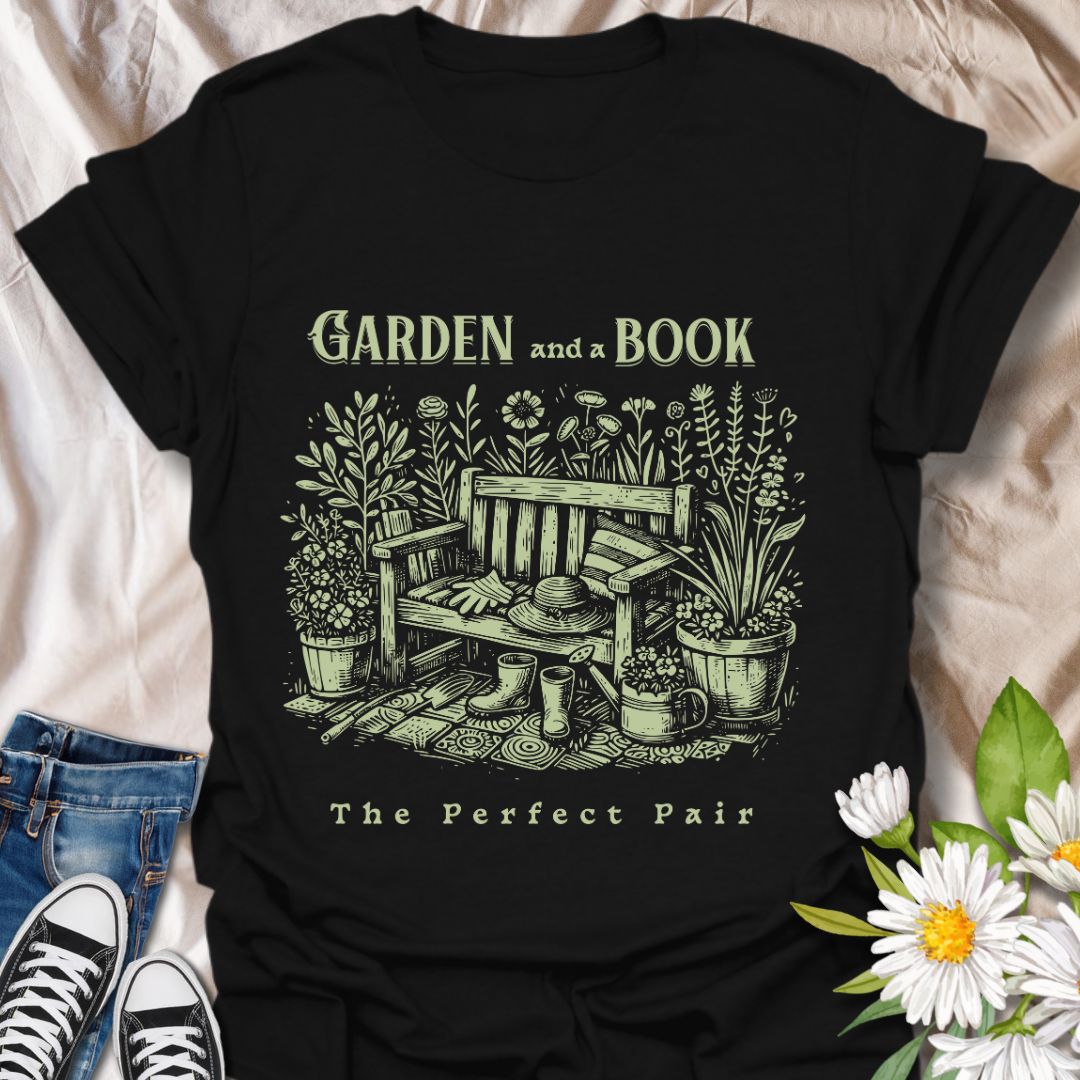 Charming “Garden and a Book - The Perfect Pair” t-shirt featuring a vintage-style garden bench, flowers, potted plants, gloves, boots, and a sun hat. Ideal gift for bookworms, gardeners, plant lovers, and anyone who enjoys relaxing outdoors with a good read.