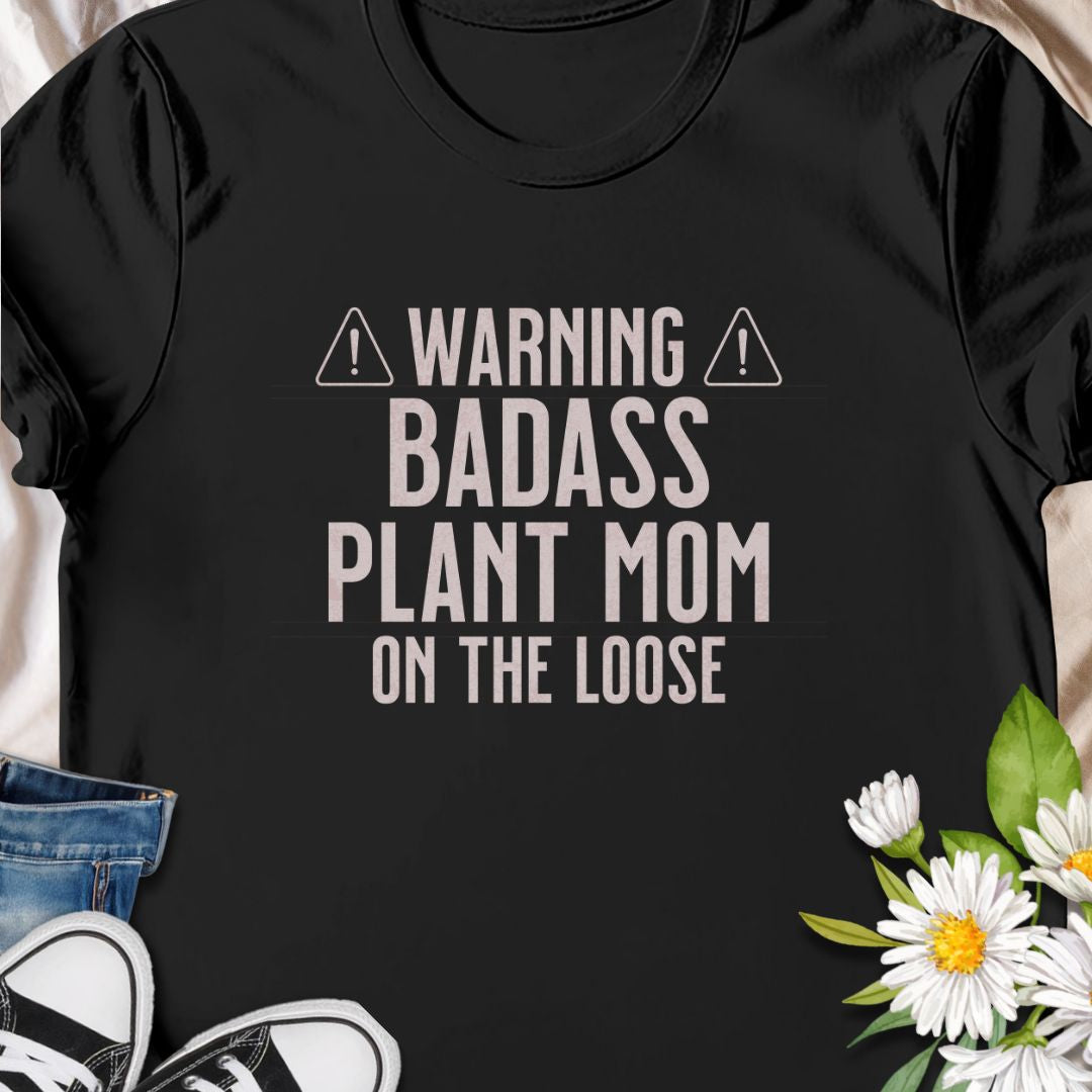 Make way for the ultimate green queen! This "Warning: Badass Plant Mom on the Loose" tee is a fun, bold design perfect for confident plant lovers and indoor jungle owners. A great gift for fierce plant moms with serious leaf pride.