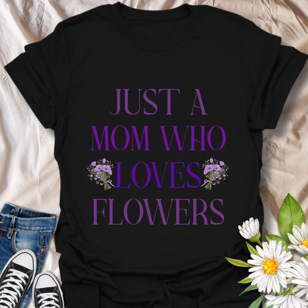 Sweet floral t-shirt with “Just a Mom Who Loves Flowers” design. Perfect Mother’s Day gift for flower-loving moms, gardeners, and nature lovers. Ideal for plant moms, garden enthusiasts, wildflower fans, and anyone who finds joy in beautiful blooms.