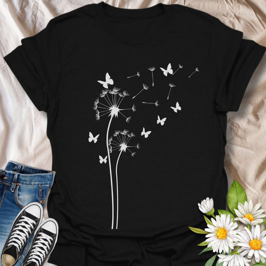 Elegant dandelion and butterfly design t-shirt capturing the beauty of nature’s gentle breeze. Perfect for nature lovers, gardeners, flower enthusiasts, and anyone who enjoys whimsical botanical art. A calming, minimalist floral graphic tee for every season.
