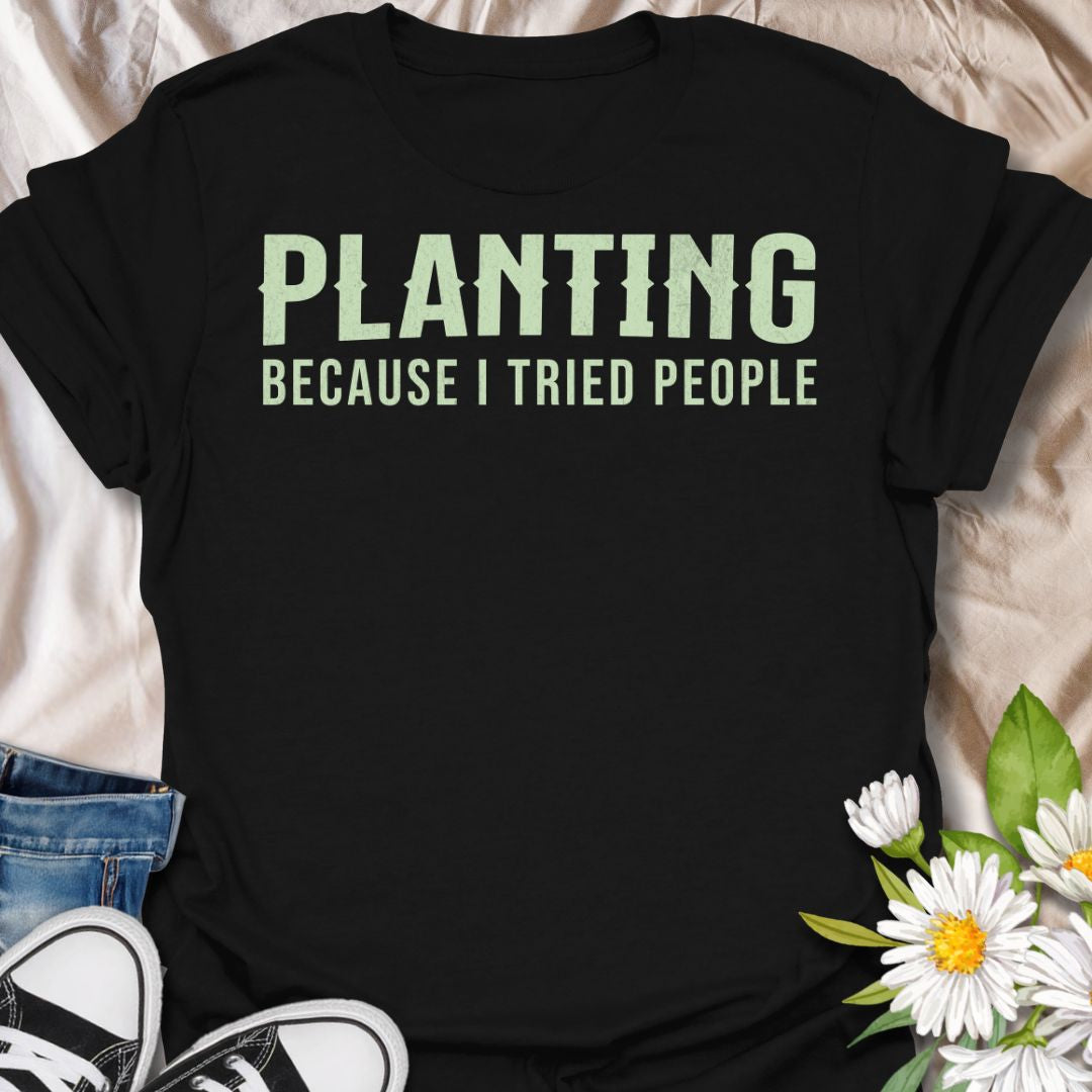 This Planting Because I Tried People t-shirt is made for gardeners and plant lovers who prefer soil, seedlings, and quiet plant time over unnecessary social interaction. Featuring bold simple typography with a funny introvert gardening message, this design has a clean, easy-to-wear look for everyday plant-parent style. Perfect for plant moms, plant dads, gardeners, houseplant lovers, introverts, and anyone who has officially chosen planting over people.