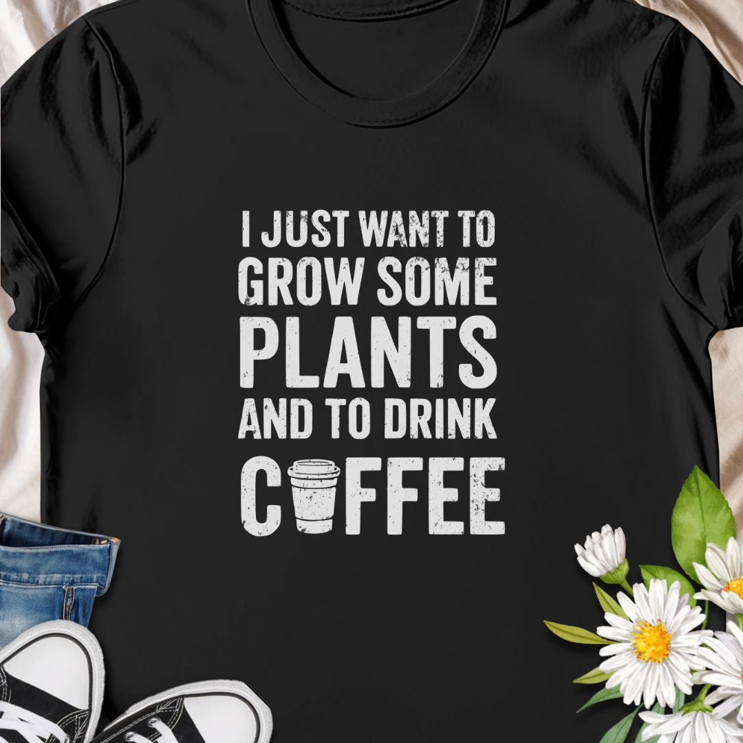 For those who thrive on greenery and caffeine! This “I Just Want to Grow Some Plants and Drink Coffee” shirt is perfect for coffee-loving plant parents. A cozy, humorous tee that pairs well with your morning brew and favorite monstera.