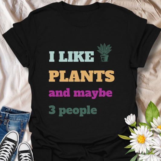 Playful "I Like Plants and Maybe 3 People" t-shirt with colorful text on Black. A perfect gift for introverted plant lovers, succulent collectors, houseplant enthusiasts, and anyone who values their greenery more than social interaction. Ideal for casual wear, plant swaps, or garden meetups.