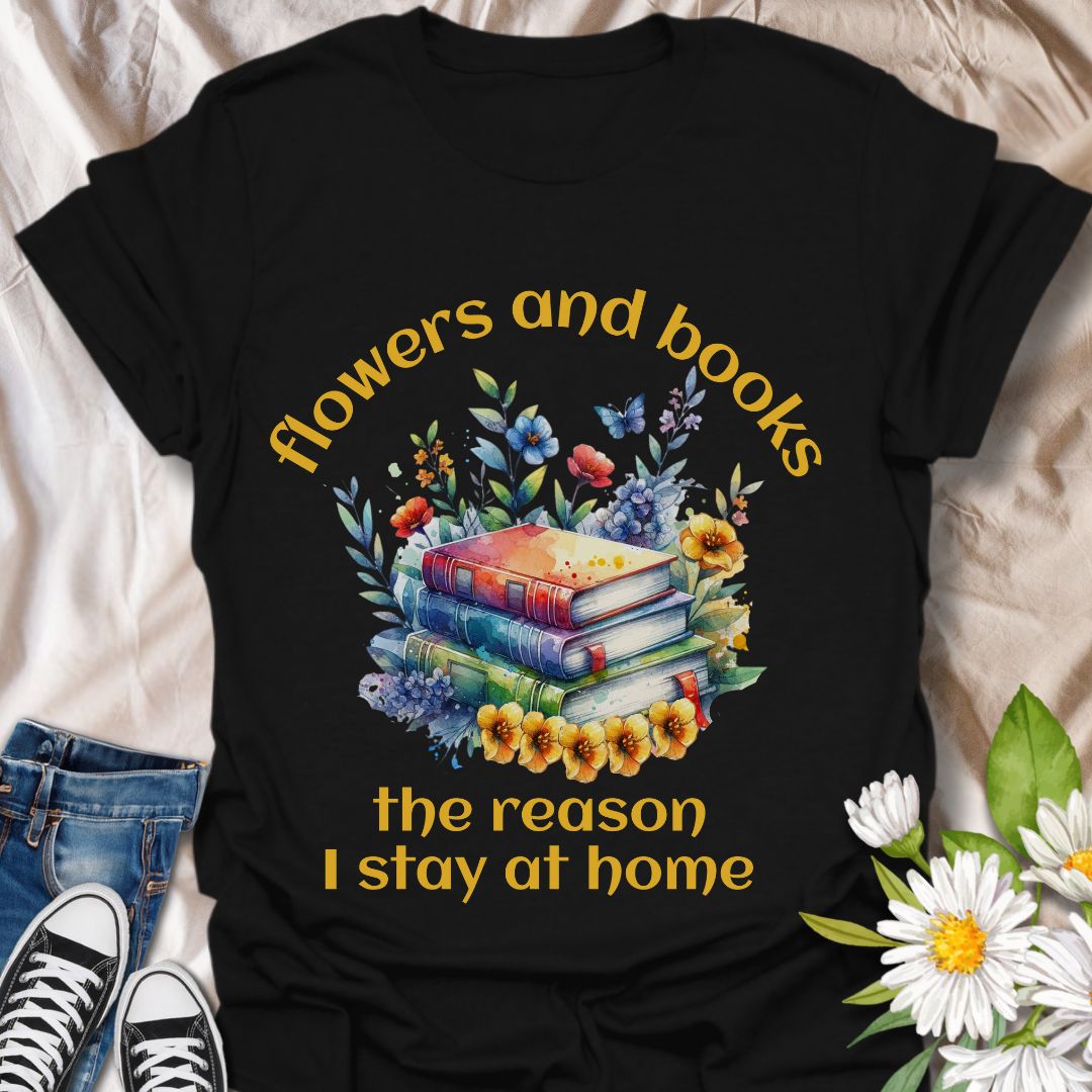 Bookworms and flower lovers unite! This charming t-shirt features a watercolor-style stack of books surrounded by blooms, with the quote “Flowers and books, the reason I stay at home.” A cozy choice for introverts and nature-loving readers.