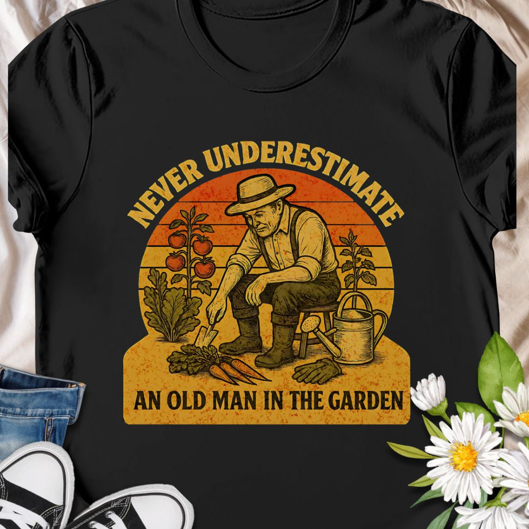 Celebrate gardening wisdom with this “Never Underestimate an Old Man in the Garden” tee featuring a retro-style illustration of a seasoned gardener harvesting his crops. A funny and heart warming shirt for grandpas, dads, or any experienced grower who takes pride in their garden. Makes a thoughtful gift for Father’s Day or retirement.