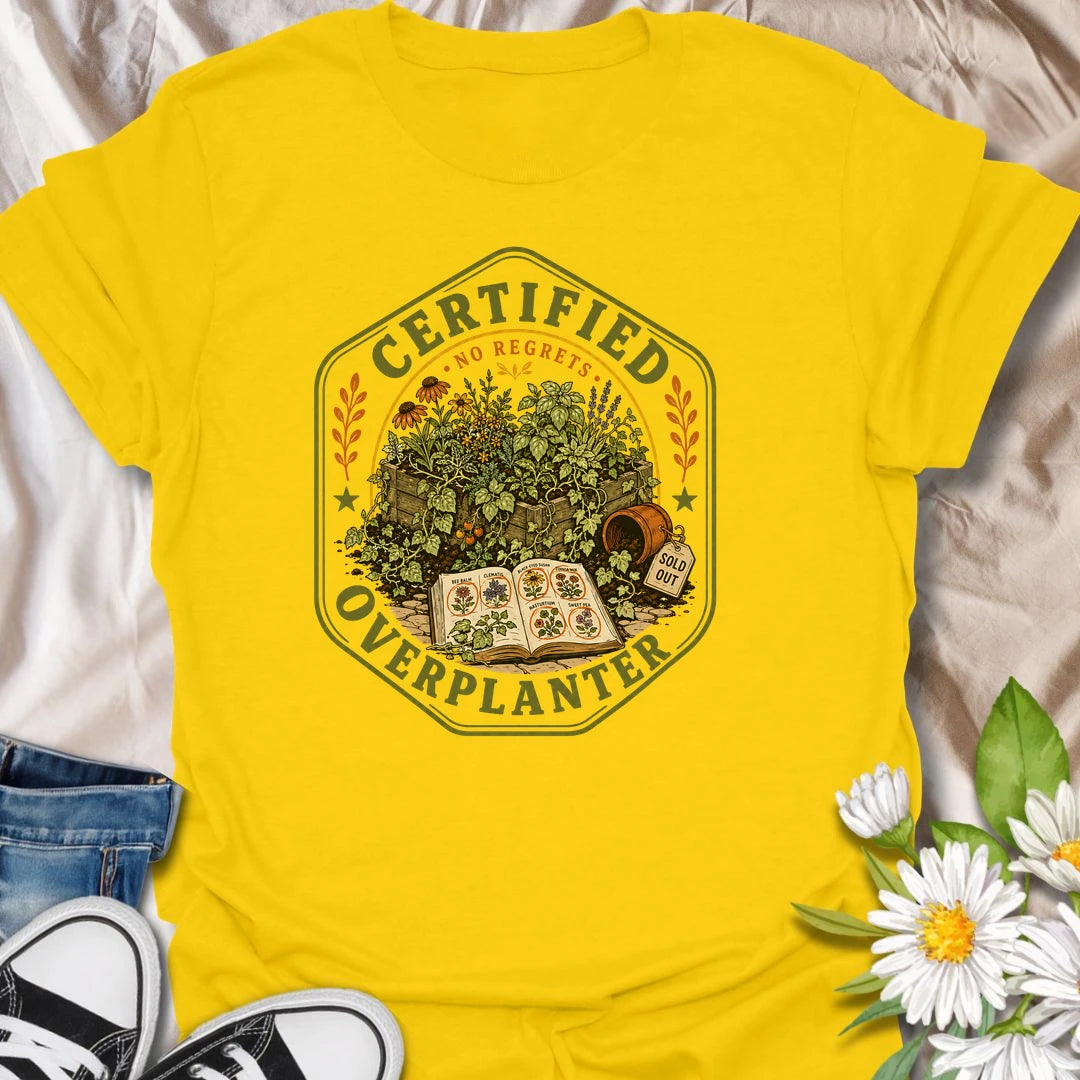 This Certified Overplanter t-shirt is made for gardeners who know there is always room for just one more seedling, even when the garden is already overflowing. Featuring a vintage badge-style design with crowded garden beds, seed packets, an open seed catalog, a sold out pot, and the phrase No Regrets, this tee has a funny plant-lover feel with classic garden-club charm. Perfect for gardeners, plant lovers, backyard growers, flower fans, vegetable gardeners, and anyone who proudly overplants every season.