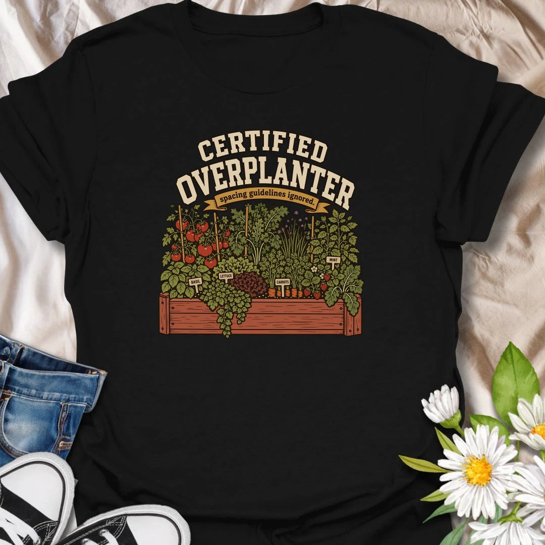 Celebrate an overflowing vegetable garden with this “Certified Overplanter” T-shirt. The detailed raised-bed design features tomatoes, carrots, lettuce, basil, mint, strawberries, and the perfect lack of spacing. It is a funny gift for ambitious gardeners who always squeeze in one more plant.