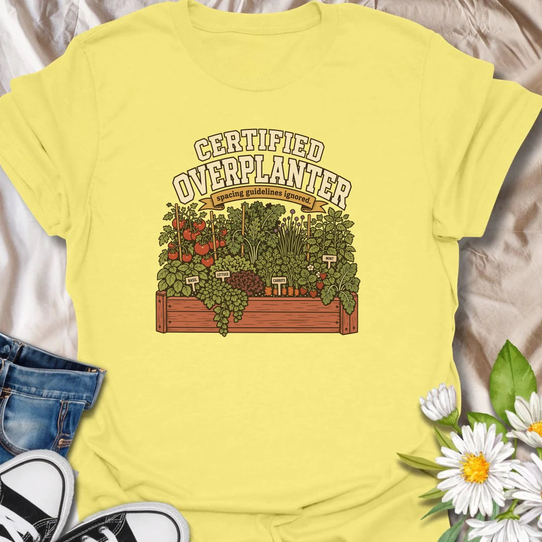 Celebrate an overflowing vegetable garden with this “Certified Overplanter” T-shirt. The detailed raised-bed design features tomatoes, carrots, lettuce, basil, mint, strawberries, and the perfect lack of spacing. It is a funny gift for ambitious gardeners who always squeeze in one more plant.