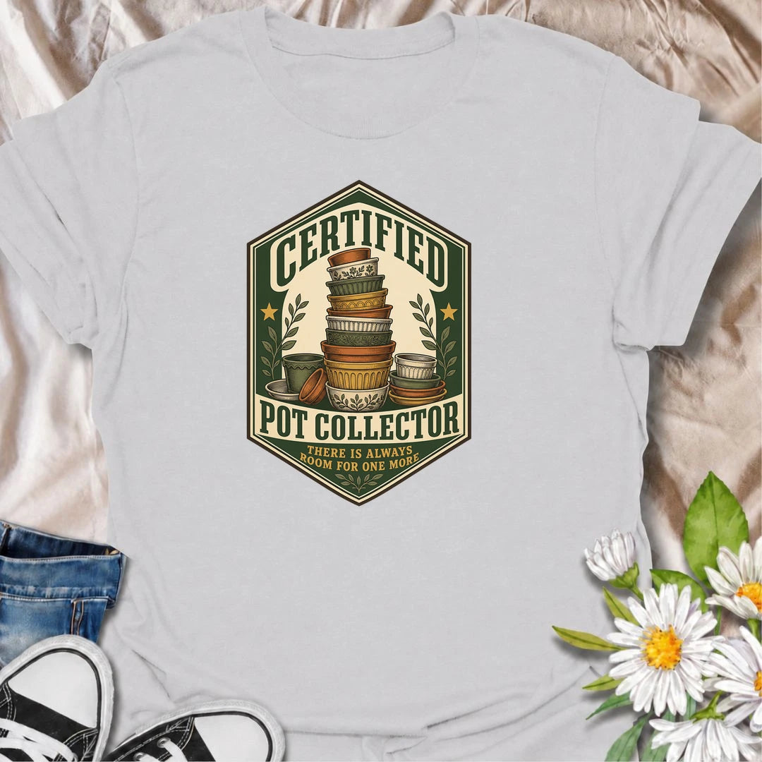 A vintage-inspired pot collector T-shirt for gardeners who always have room for one more planter. A fun gift for plant lovers and pottery collectors.