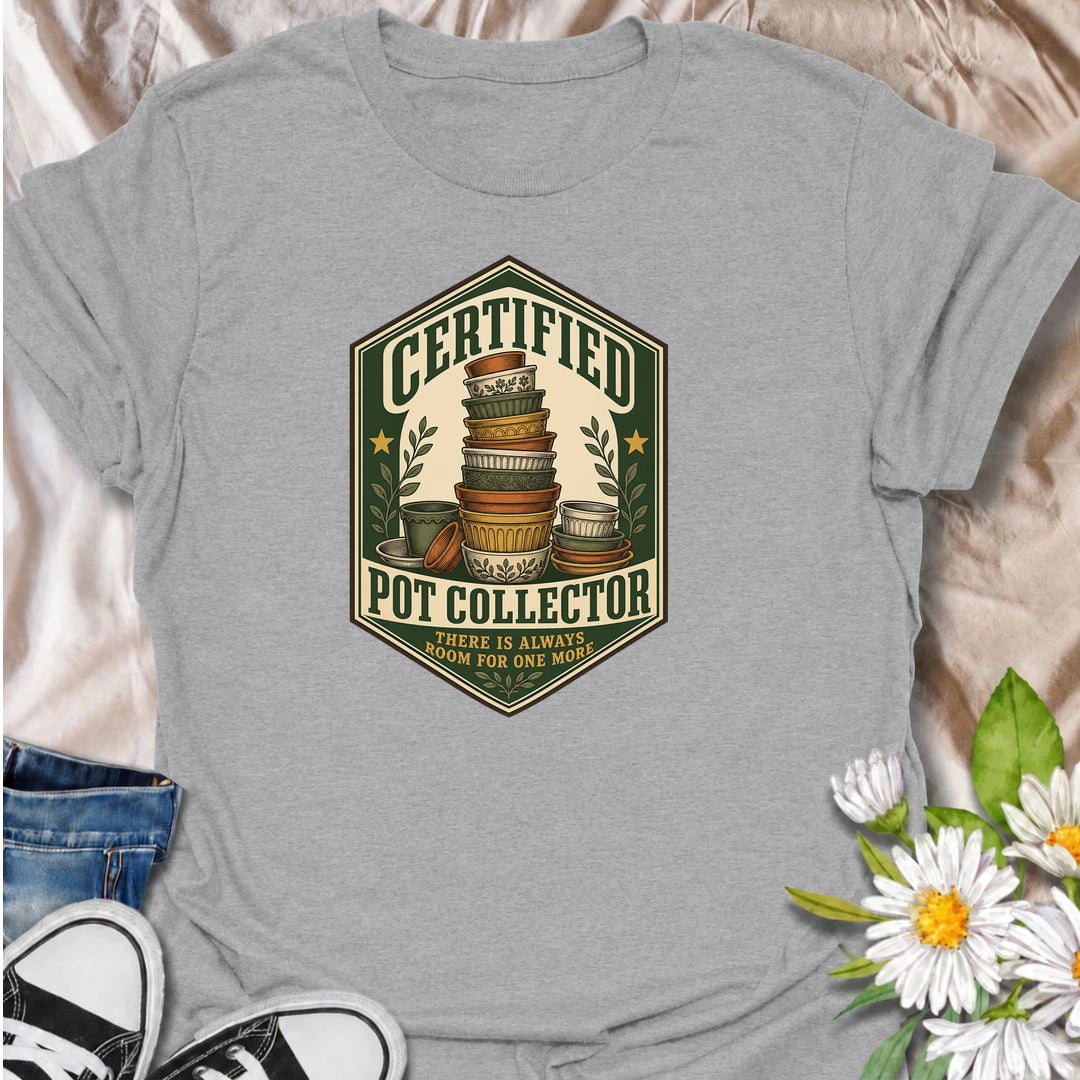 A vintage-inspired pot collector T-shirt for gardeners who always have room for one more planter. A fun gift for plant lovers and pottery collectors.