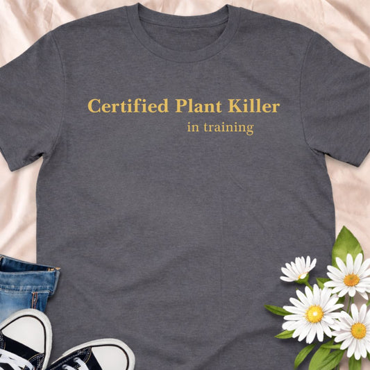 Own your not-so-green thumb with this “Certified Plant Killer in Training” t-shirt. A playful plant lover tee that makes a perfect funny gift for new plant parents still learning how to keep their houseplants alive.