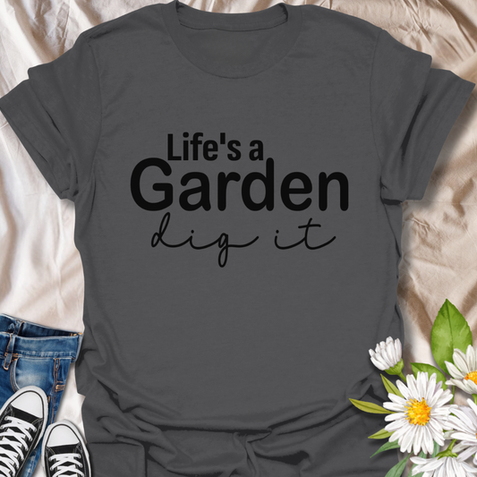 Brighten up your wardrobe and your day with this “Life's a Garden, Dig It” t-shirt — perfect for plant lovers, gardeners, and anyone with a positive outlook on life. Featuring a fun gardening pun in bold typography, this tee is a must-have for outdoor enthusiasts and green thumbs alike.