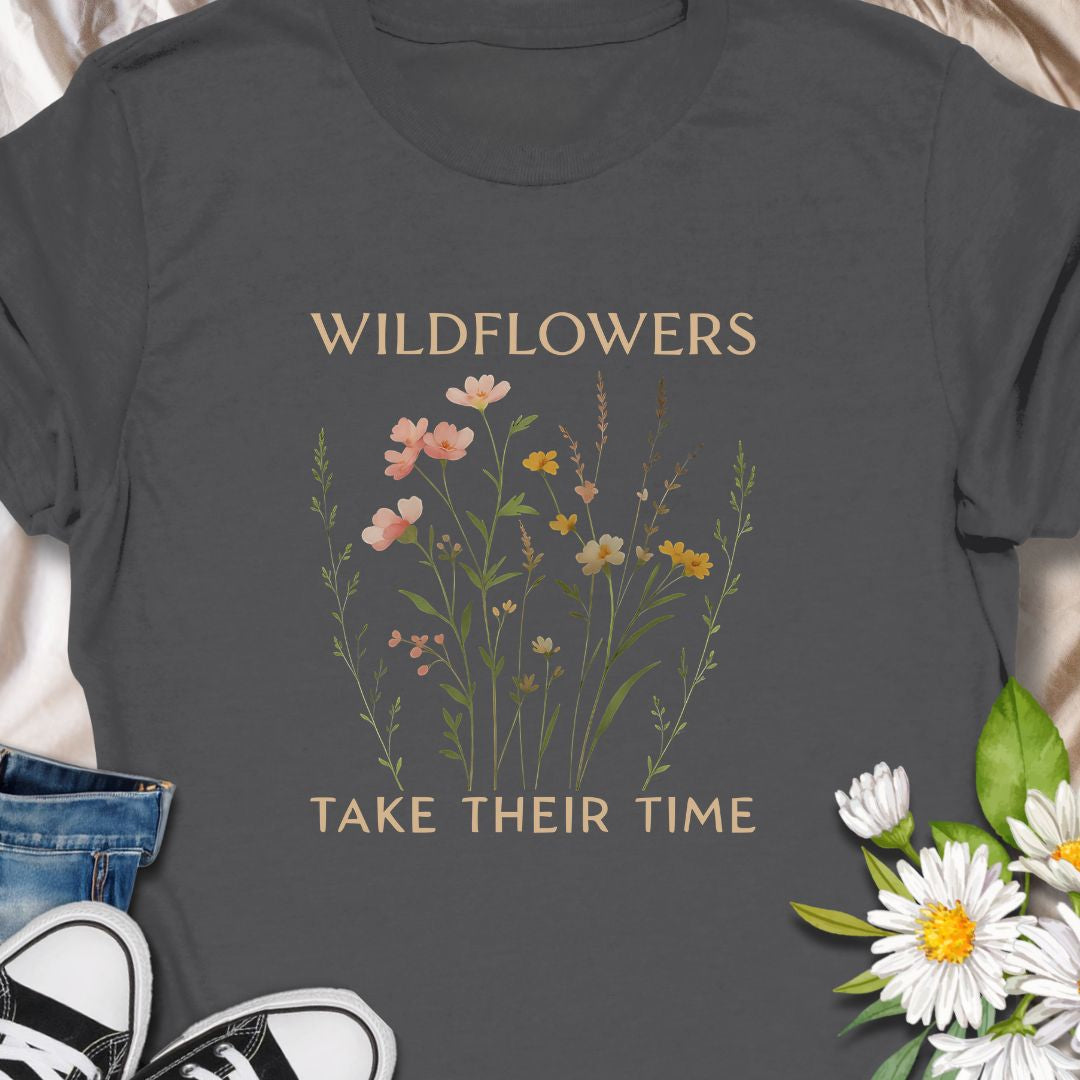 Inspirational wildflower tee featuring soft meadow flowers and motivational quote. A calming nature-themed shirt.