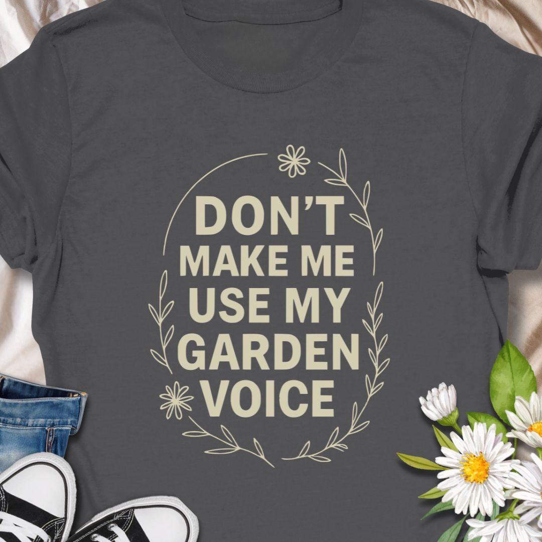 Let your garden attitude bloom with this funny “Don’t Make Me Use My Garden Voice” t-shirt. Ideal for gardeners who aren’t afraid to speak their mind—or to shout over the hedge! This tee makes a perfect gift for plant moms, green thumbs, or anyone who runs on coffee and compost.