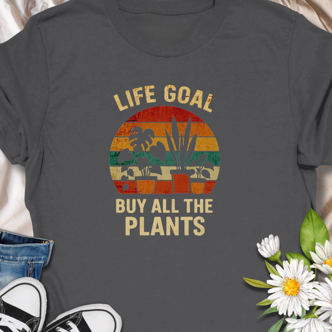 Set your priorities straight with this vintage-style “Life Goal: Buy All The Plants” tee! Featuring a colorful retro design with potted plants, it's the perfect shirt for proud plant collectors, indoor jungle creators, and every crazy plant person. A must-have for plant moms and dads!