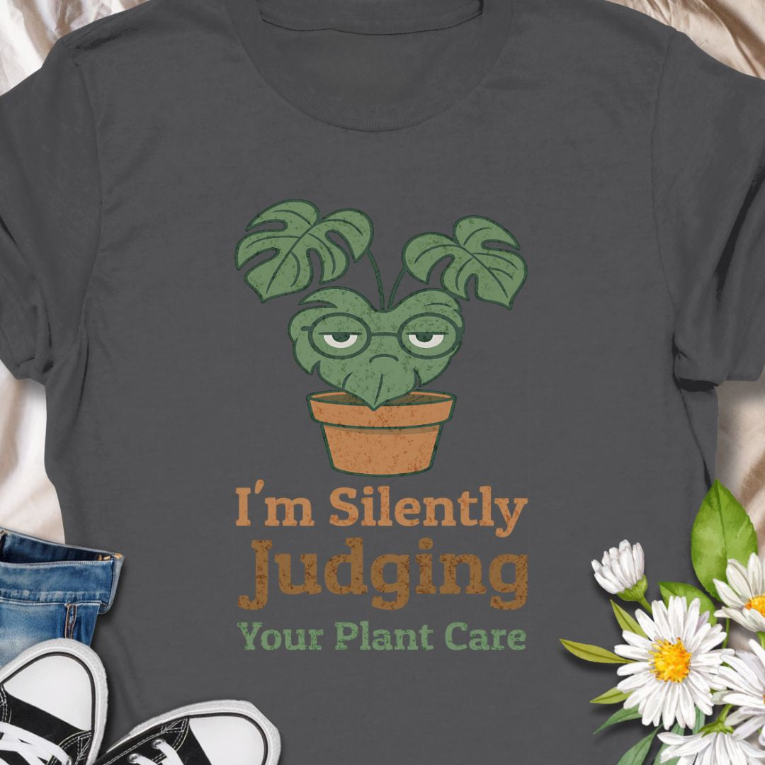Calling all sassy plant parents – this “I'm Silently Judging Your Plant Care” tee is made for you! Featuring a moody monstera in a pot, it’s perfect for green thumbs who have high standards and a sense of humor. Ideal gift for plant moms, plant dads, and houseplant snobs alike!