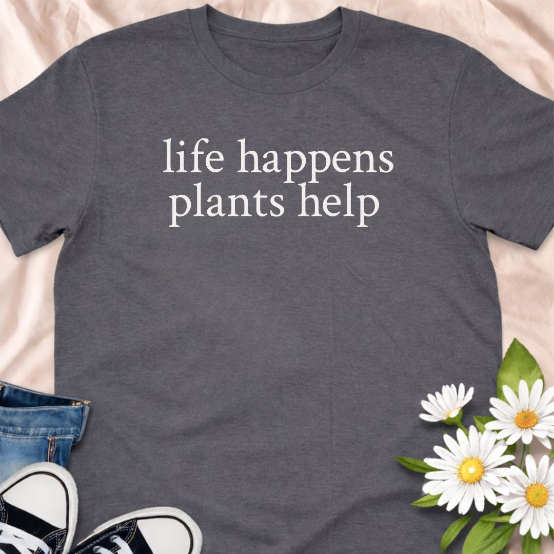 Life happens, plants help. This minimalist botanical t-shirt is designed for plant lovers, gardeners, and anyone who finds comfort in greenery. A calm, thoughtful tee that celebrates nature, self-care, and the healing power of plants.
