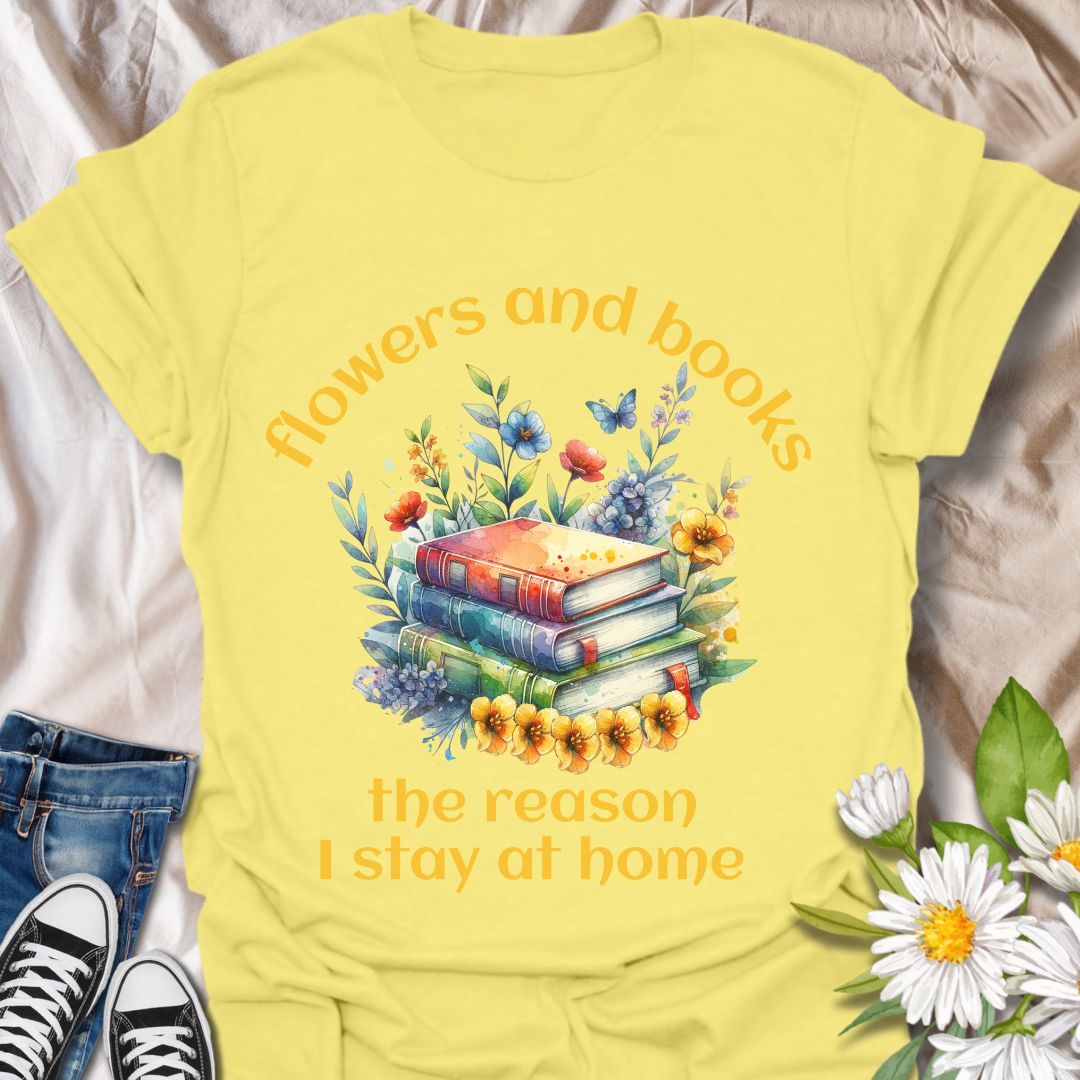 Bookworms and flower lovers unite! This charming t-shirt features a watercolor-style stack of books surrounded by blooms, with the quote “Flowers and books, the reason I stay at home.” A cozy choice for introverts and nature-loving readers.