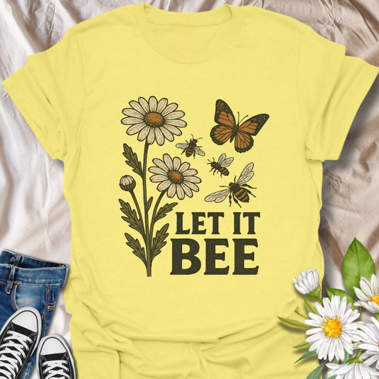 Spread a positive eco-friendly message with this charming graphic t-shirt featuring daisies, bees, a butterfly, and the playful phrase "Let It Bee." Perfect for pollinator supporters, nature lovers, and anyone who enjoys whimsical botanical-themed apparel.