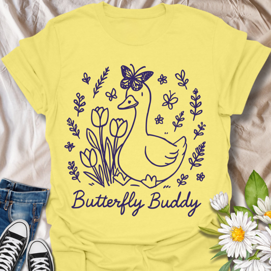 Adorable ‘Butterfly Buddy’ goose shirt featuring a sweet goose with tulips and butterflies. Perfect for animal lovers, gardeners, and whimsical spring fashion.