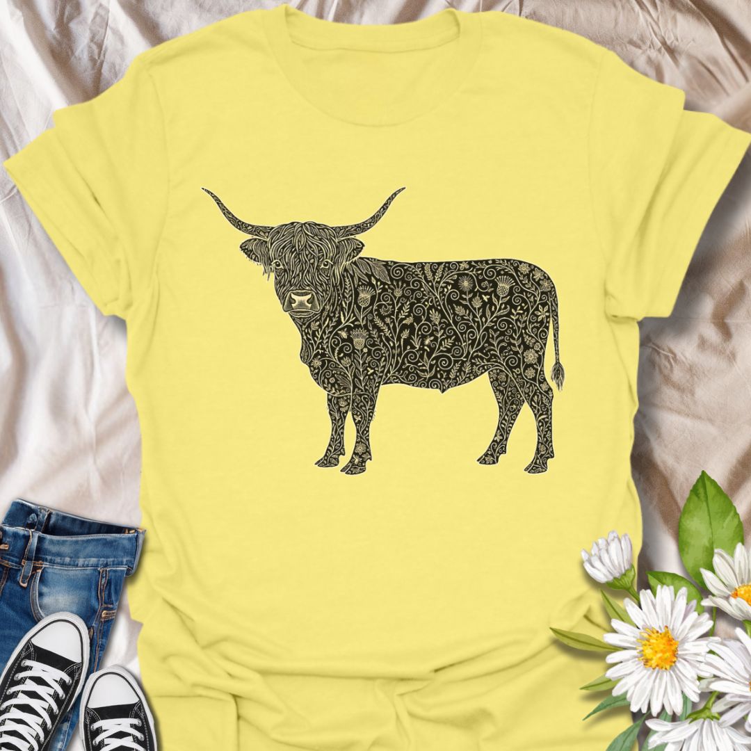 Show off your love for rustic charm and artistic nature with this intricately designed Highland cow graphic t-shirt. Featuring a beautifully detailed floral pattern within the iconic silhouette of a Highland cow, this design is perfect for farm lovers, botanical art fans, and anyone who appreciates country-inspired fashion with a creative twist.