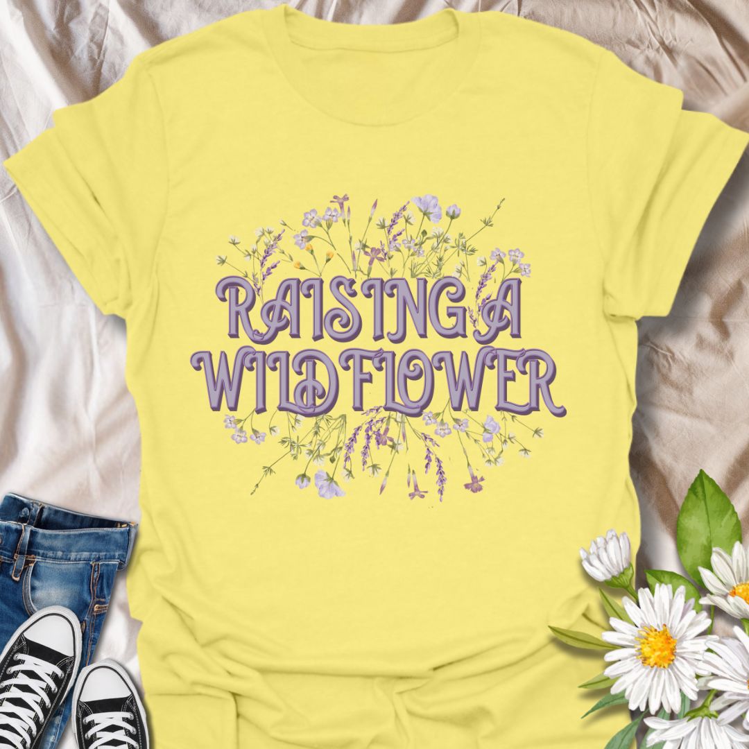 Adorable “Raising a Wildflower” t-shirt with soft pastel wildflowers and playful retro typography. A sweet tee for moms raising free-spirited kids, nature lovers, or wildflower fans. Perfect gift for proud plant moms and botanical boho style lovers.