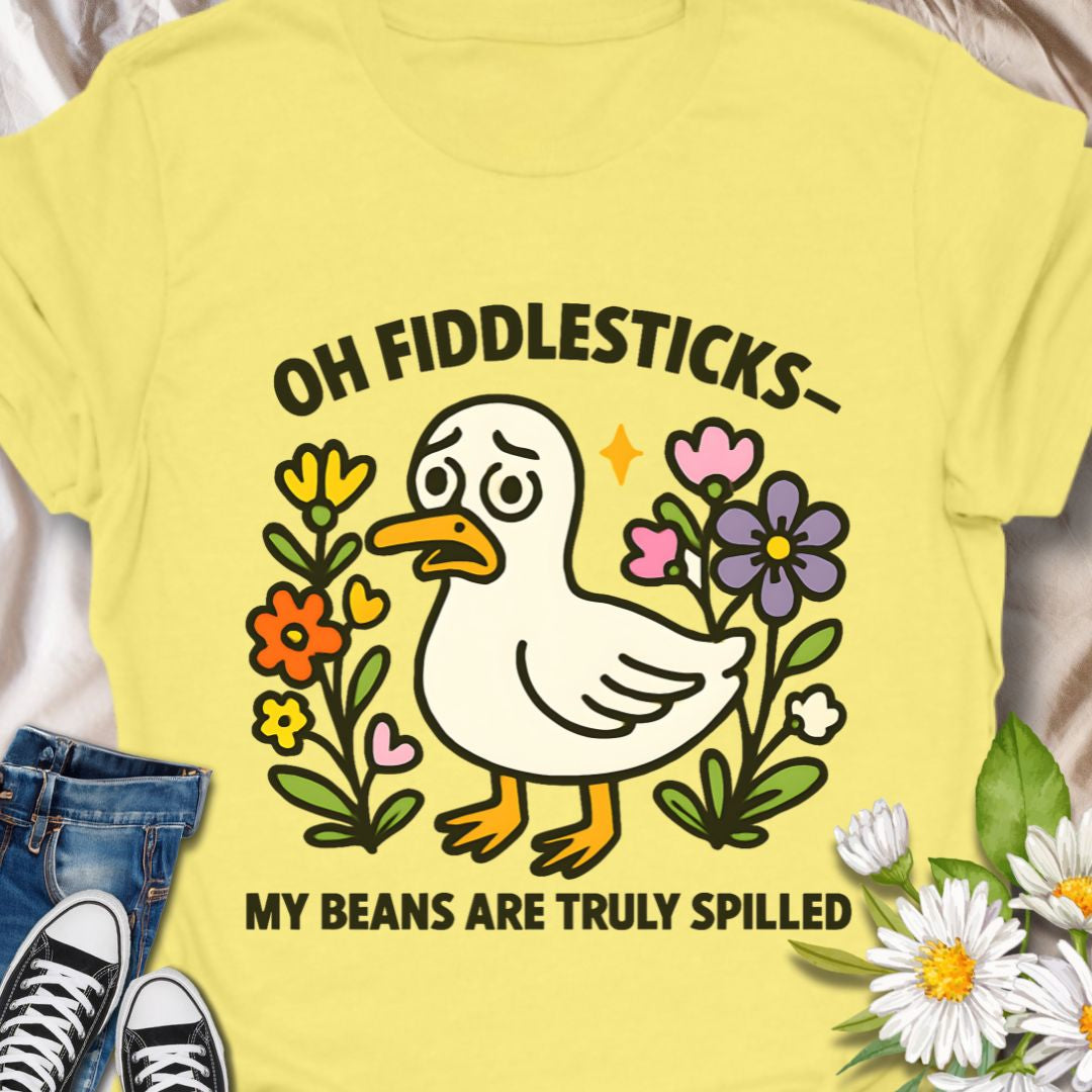 This adorable duck t-shirt featuring the phrase "Oh Fiddlesticks – My Beans Are Truly Spilled" blends wholesome humor with colorful floral charm. Perfect for anyone who thrives on quirky expressions and cute designs. Great gift for the emotionally expressive with the playful, slightly bewildered duck.  Wear it when you want to spark a smile, or share a goofy moment. 