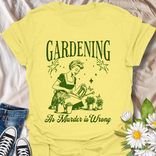 Dark humor gardening t-shirt with retro housewife design and “Gardening Because Murder is Wrong” text. Ideal for plant moms, gardeners, and those who love sarcastic garden humor.  Cornsilk
