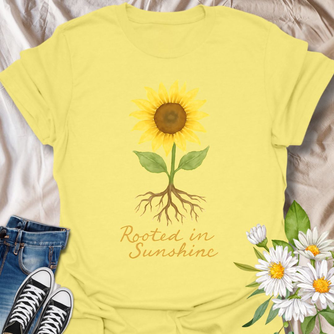 Uplifting sunflower t-shirt with detailed roots and the inspiring phrase ‘Rooted in Sunshine.’ Perfect for nature lovers, gardeners, plant moms, and anyone who finds strength and joy in growth, positivity, and sunshine. A thoughtful gift for self-care, mindfulness, and outdoor enthusiasts.