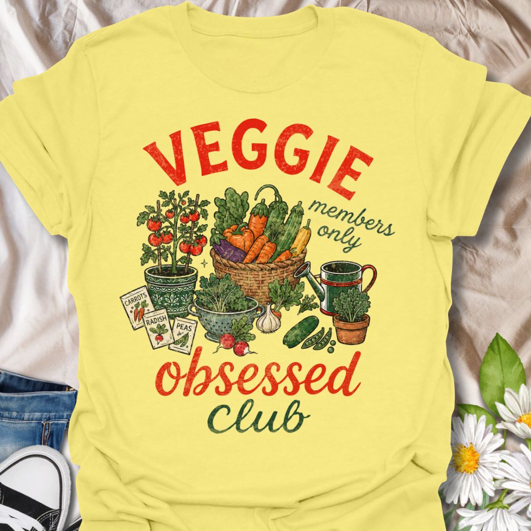 This Veggie Obsessed Club t-shirt is perfect for gardeners, vegetable lovers, and homegrown food fans. Featuring a colorful illustrated harvest scene with tomatoes, carrots, cucumbers, seed packets, and a watering can, this fun gardening tee is great for anyone who loves growing their own food and spending time in the garden.