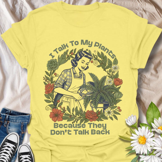 Channel your inner plant whisperer with this vintage-style t-shirt that says “I Talk to My Plants Because They Don’t Talk Back.” A humorous design perfect for plant parents and introverts.
