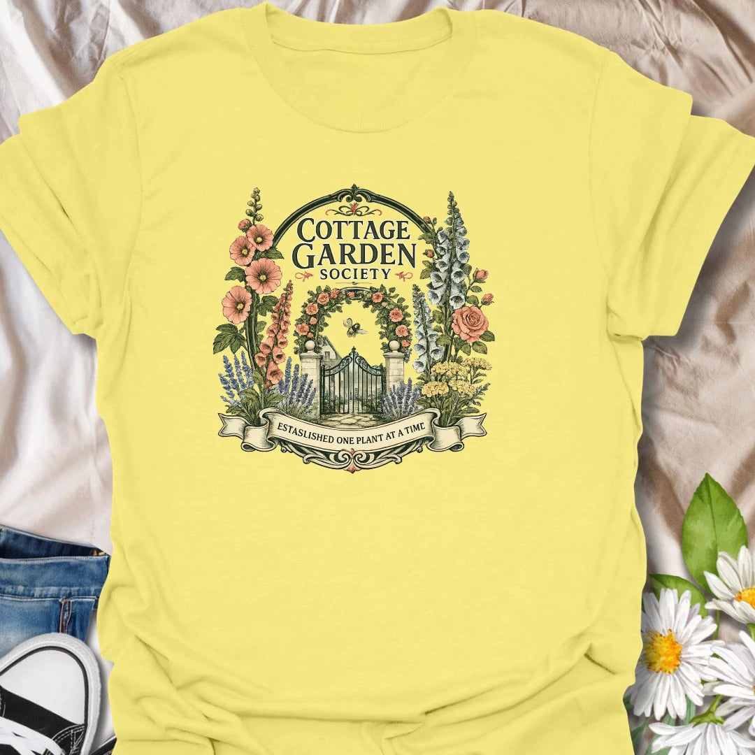 Cottage garden t-shirt with floral gate artwork, vintage garden society style, and a soft botanical feel for gardeners and flower lovers.