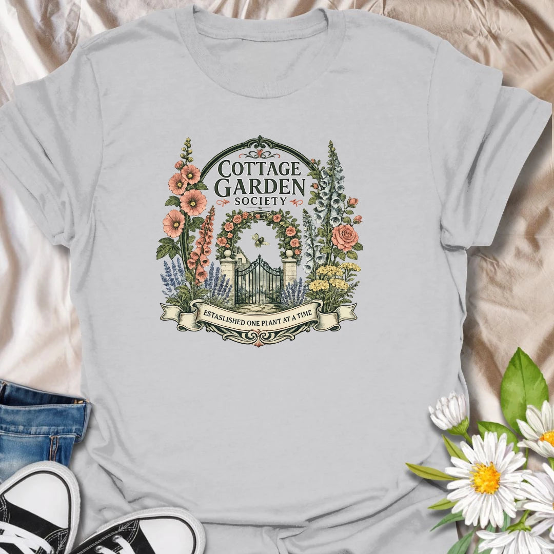 Cottage garden t-shirt with floral gate artwork, vintage garden society style, and a soft botanical feel for gardeners and flower lovers.