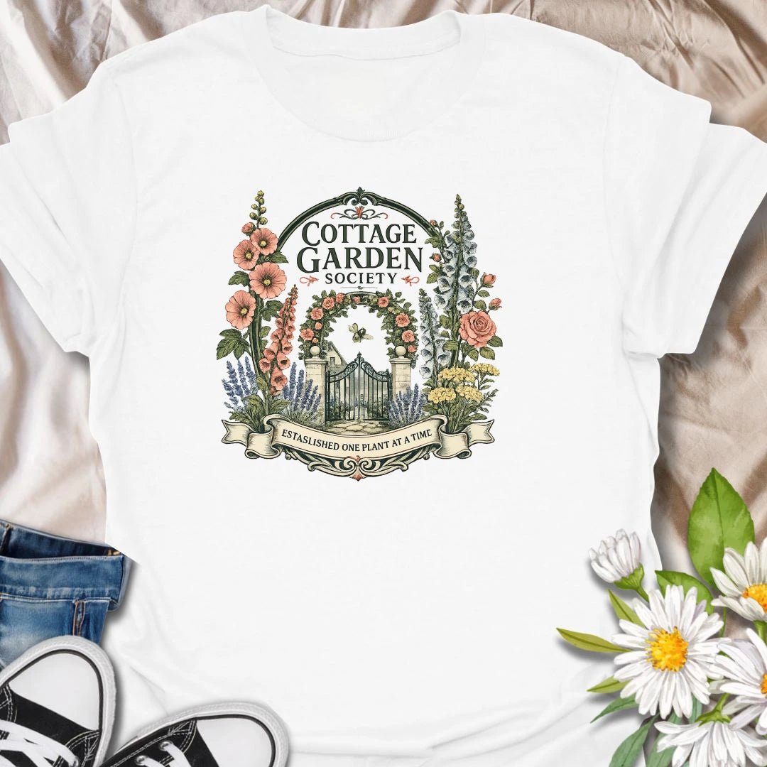 Cottage garden t-shirt with floral gate artwork, vintage garden society style, and a soft botanical feel for gardeners and flower lovers.