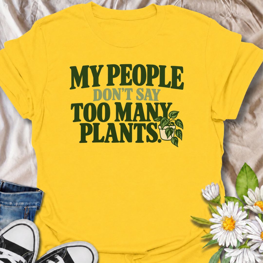 A funny plant T-shirt for anyone who knows the right people never say you have too many plants. The phrase “My People Don’t Say Too Many Plants” turns plant collecting into a little badge of belonging for houseplant lovers and indoor gardeners. Featuring bold retro typography with a simple trailing plant accent, the design stays clean, readable, and easy to wear. It makes a great gift for plant parents, nursery regulars, and anyone whose friends fully support one more plant purchase. Perfect for plant swaps