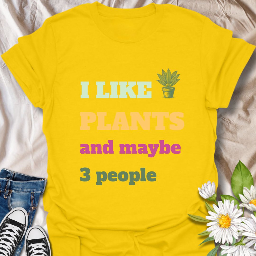Playful "I Like Plants and Maybe 3 People" t-shirt with colorful text on bright daisy. A perfect gift for introverted plant lovers, succulent collectors, houseplant enthusiasts, and anyone who values their greenery more than social interaction. Ideal for casual wear, plant swaps, or garden meetups.