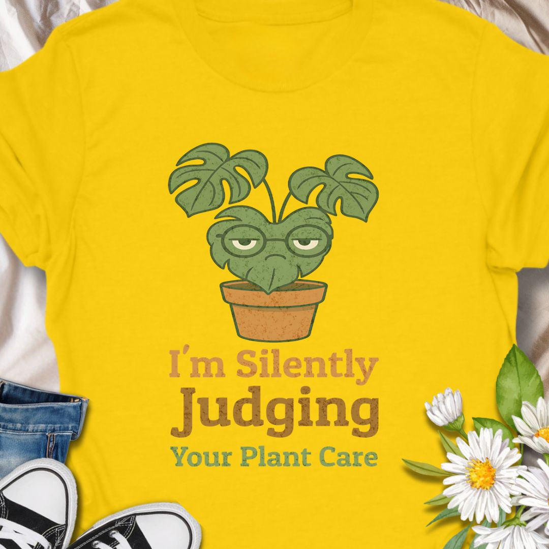 Calling all sassy plant parents – this “I'm Silently Judging Your Plant Care” tee is made for you! Featuring a moody monstera in a pot, it’s perfect for green thumbs who have high standards and a sense of humor. Ideal gift for plant moms, plant dads, and houseplant snobs alike!