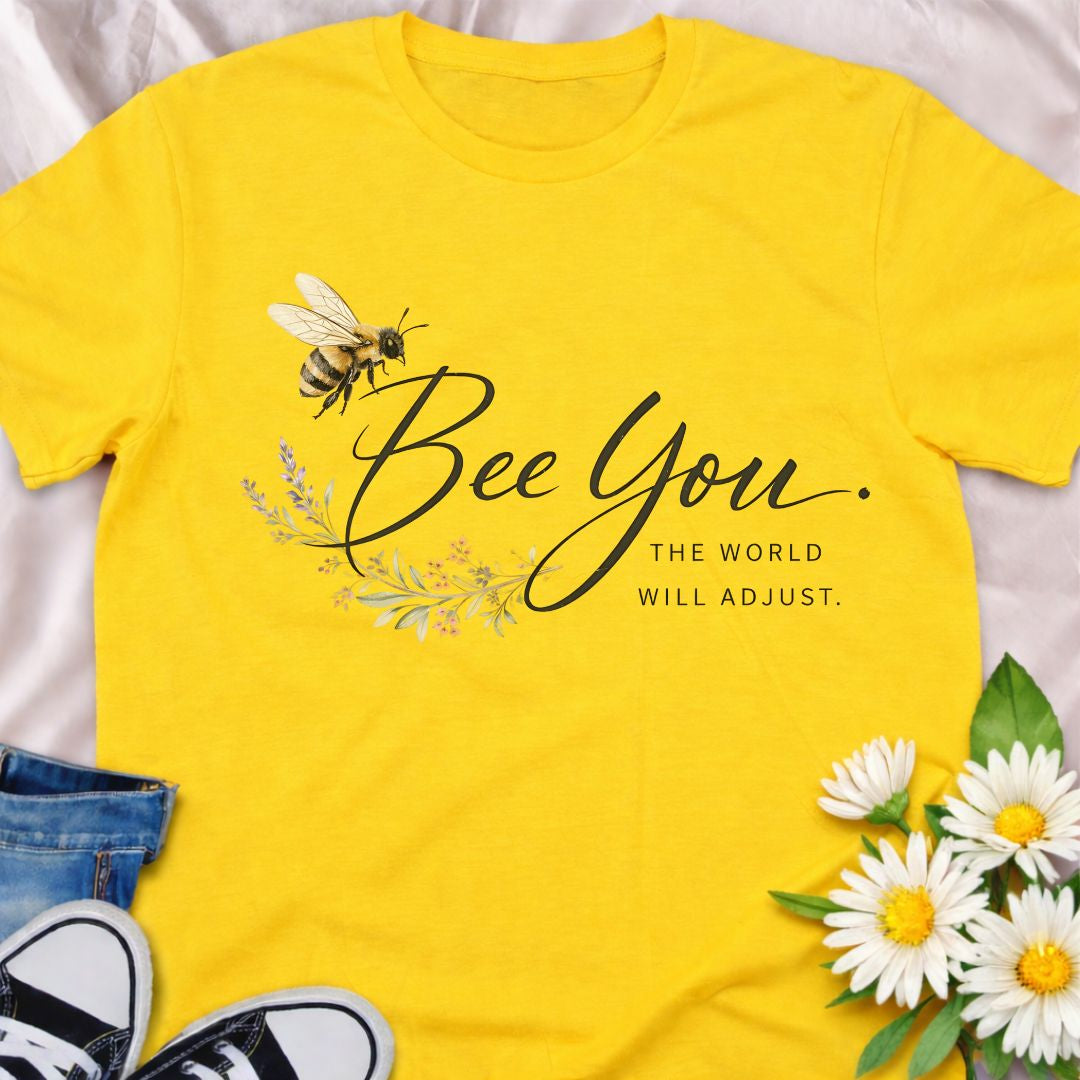 Bee You, the world will adjust. This inspirational bee and botanical t-shirt celebrates self-confidence, authenticity, and nature-led living. A thoughtful gift for bee lovers, plant lovers, and anyone who believes in staying true to themselves.