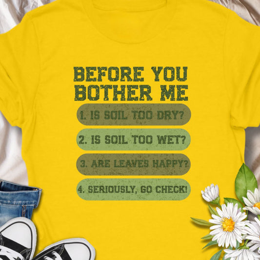 Show off your plant parent priorities with this hilarious “Before You Bother Me” plant care checklist t-shirt. Featuring a fun reminder to check soil moisture and leaf happiness first, this tee is perfect for serious plant lovers with a great sense of humor. Ideal gift for gardeners, indoor plant enthusiasts, and green-thumbed introverts.