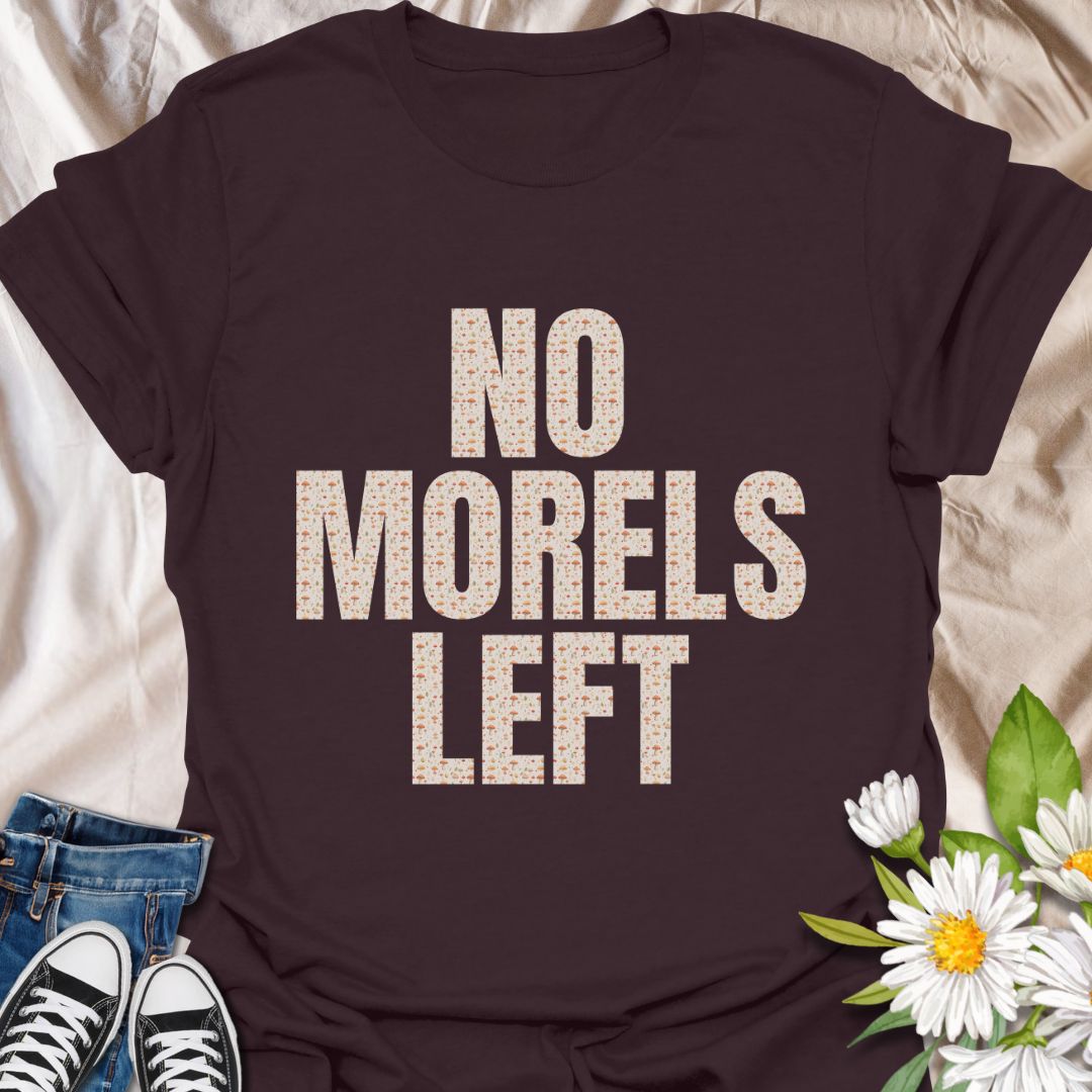 Show off your mushroom humor with this fun graphic t-shirt featuring the clever phrase "No Morels Left" which has mushroom designs within the letters.  Perfect for mushroom hunters, fungi enthusiasts, gardeners, and anyone who enjoys witty nature-inspired apparel.
