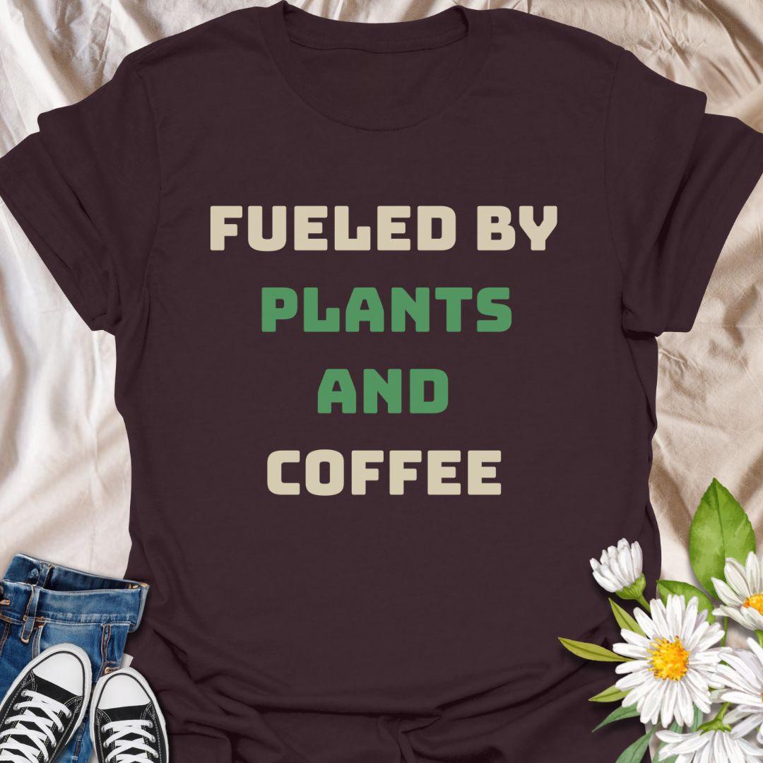 Stay energized and stylish with this fun graphic t-shirt featuring the phrase "Fueled by Plants and Coffee." Perfect for plant parents, gardeners, coffee lovers, and anyone who enjoys a lifestyle rooted in greenery and caffeine.