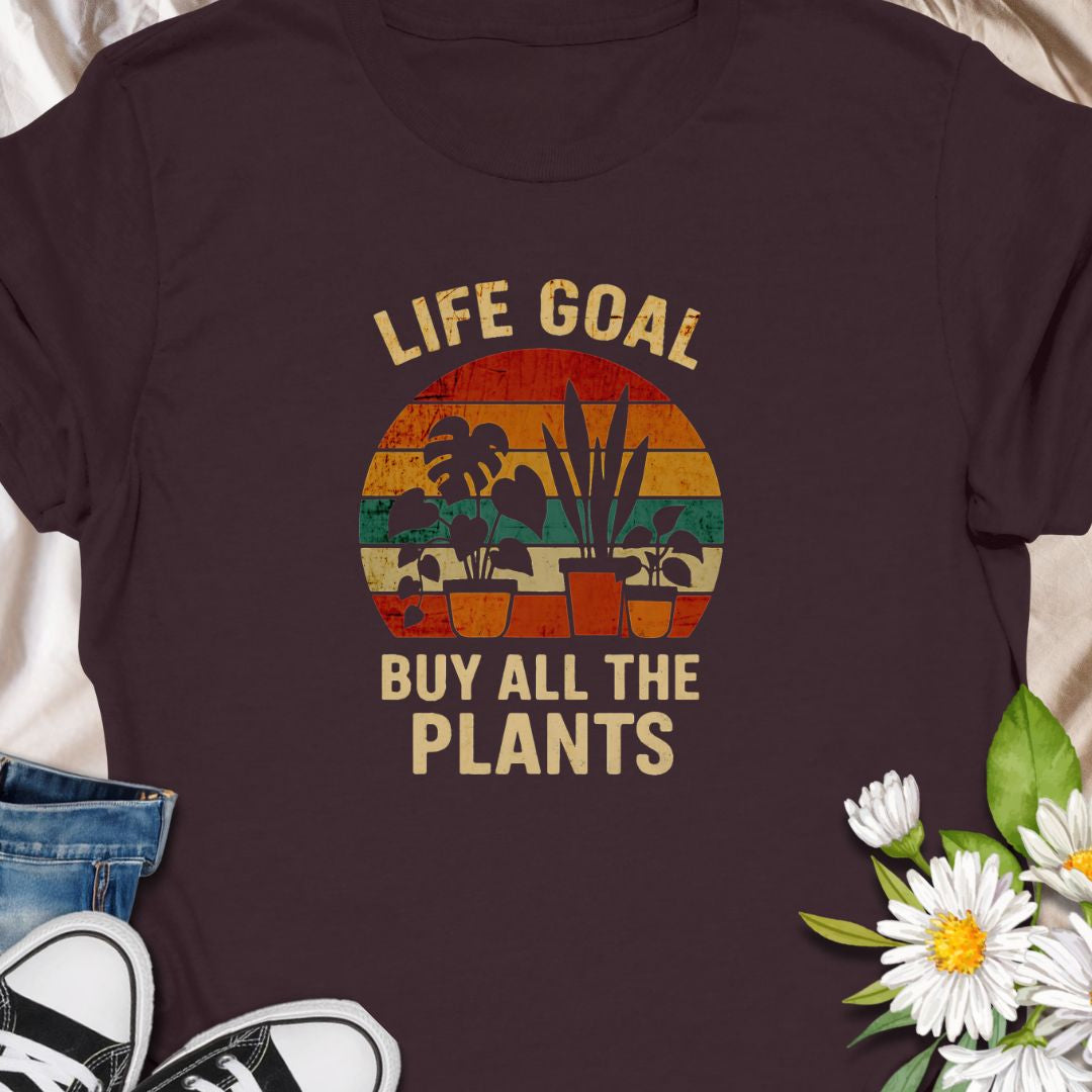 Set your priorities straight with this vintage-style “Life Goal: Buy All The Plants” tee! Featuring a colorful retro design with potted plants, it's the perfect shirt for proud plant collectors, indoor jungle creators, and every crazy plant person. A must-have for plant moms and dads!