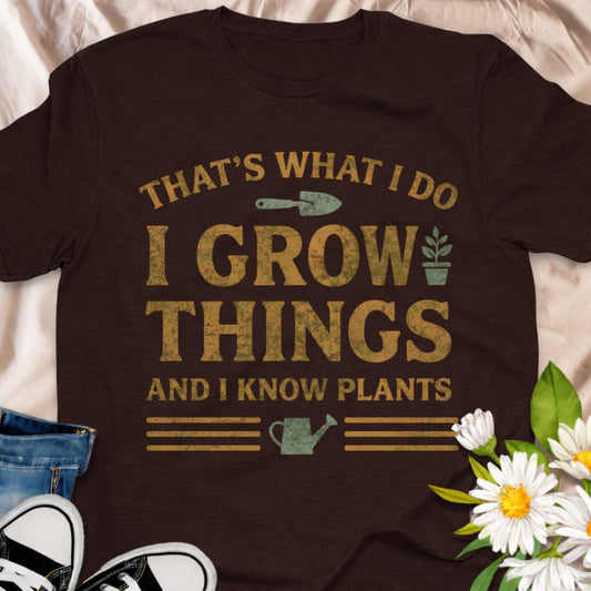 Show off your green-thumb confidence with this “That’s What I Do – I Grow Things And I Know Plants” t-shirt. With a rustic, vintage-style print featuring a trowel, potted plant, and watering can, it’s the perfect funny gift for proud gardeners, plant parents, and allotment lovers who know their way around a garden bed.