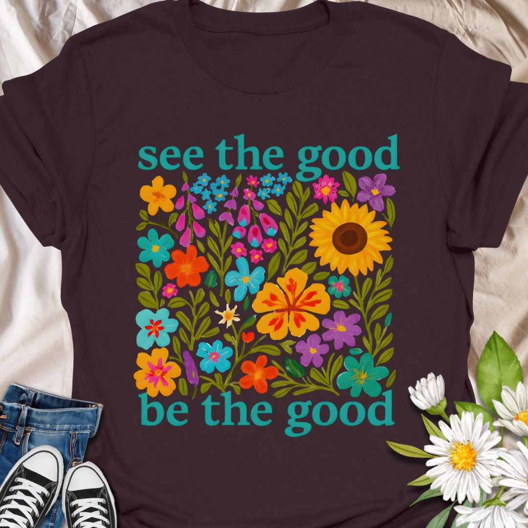 Brighten your day and your outfit with this vibrant floral t-shirt featuring the inspiring message: "See the good, be the good." Perfect for garden lovers, positivity seekers, and anyone who believes in spreading kindness. A cheerful and meaningful gift for plant moms, flower fans, and happy souls alike.