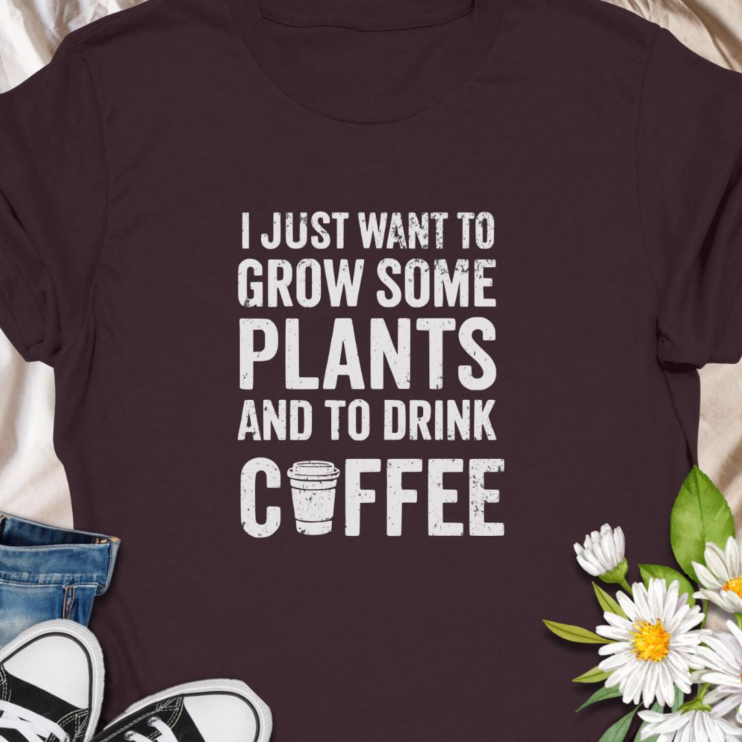 For those who thrive on greenery and caffeine! This “I Just Want to Grow Some Plants and Drink Coffee” shirt is perfect for coffee-loving plant parents. A cozy, humorous tee that pairs well with your morning brew and favorite monstera.