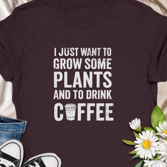 For those who thrive on greenery and caffeine! This “I Just Want to Grow Some Plants and Drink Coffee” shirt is perfect for coffee-loving plant parents. A cozy, humorous tee that pairs well with your morning brew and favorite monstera.