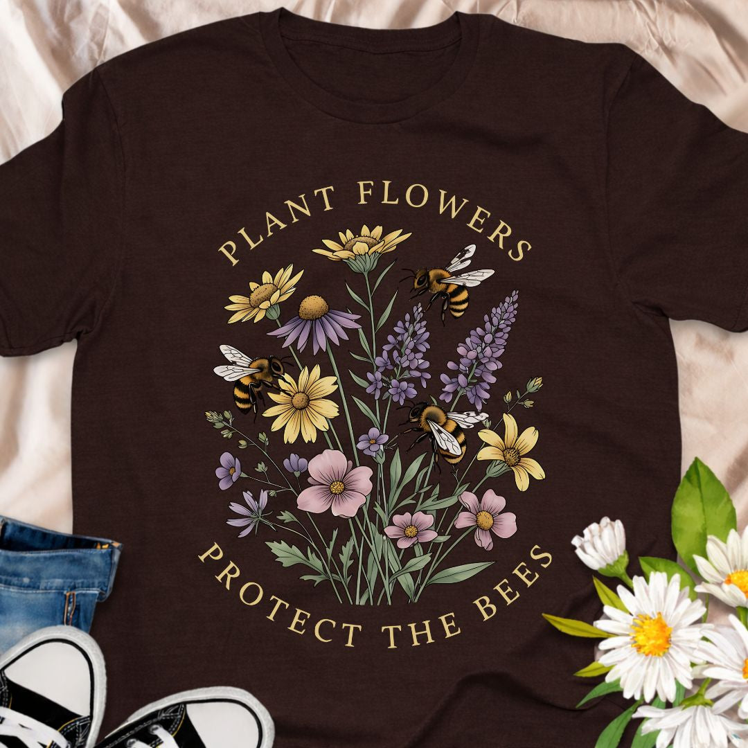 Spread a pollinator-friendly message with this “Plant Flowers, Protect the Bees” wildflower t-shirt. Packed with colorful blooms and busy bees, it’s a beautiful eco-conscious gift for gardeners, beekeepers, and nature lovers.